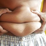 explain the difference between essential body fat and storage body fat