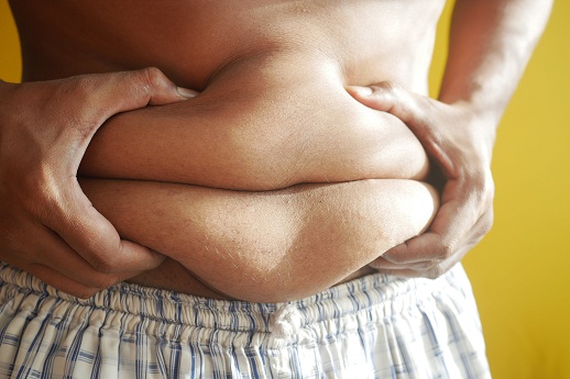 explain the difference between essential body fat and storage body fat