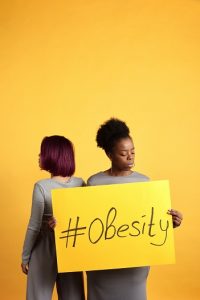 What are the causes of obesity?